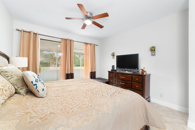 bedroom with tile patterned flooring, a ceiling fan, and baseboards