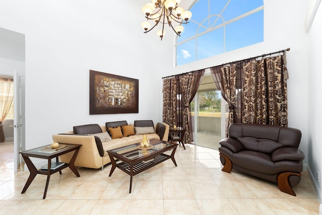 tiled living area with a high ceiling and an inviting chandelier