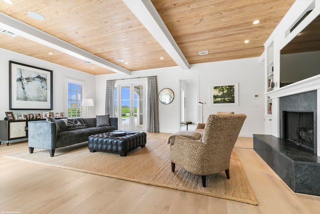 living room featuring beam ceiling, wood-type flooring, and wooden ceiling