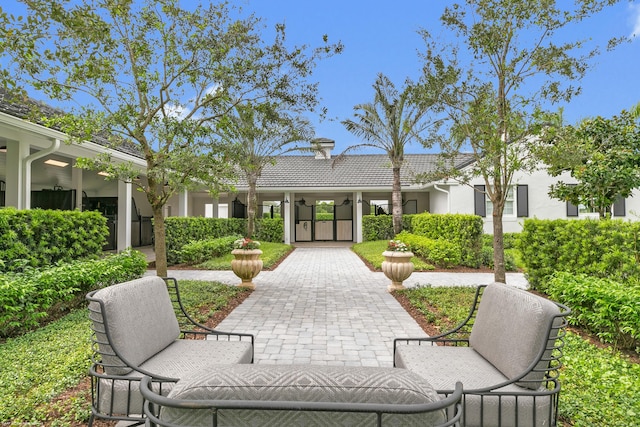 surrounding community featuring a patio area