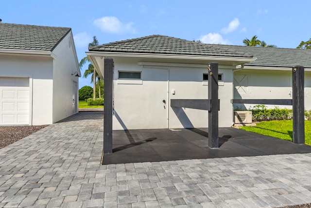 view of patio / terrace with a garage