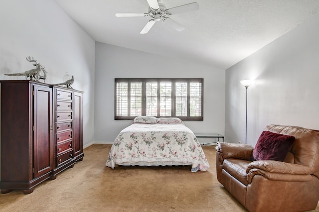 carpeted bedroom featuring vaulted ceiling and ceiling fan