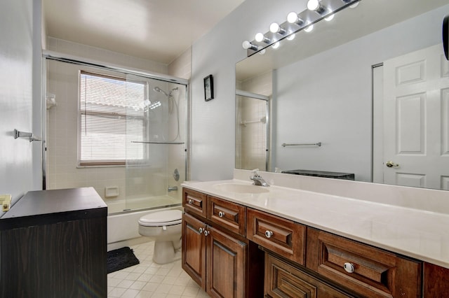 full bathroom featuring vanity, toilet, enclosed tub / shower combo, and tile patterned flooring