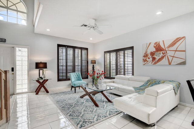 living room featuring a healthy amount of sunlight and light tile patterned floors