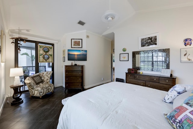 bedroom with ornamental molding, multiple windows, and lofted ceiling