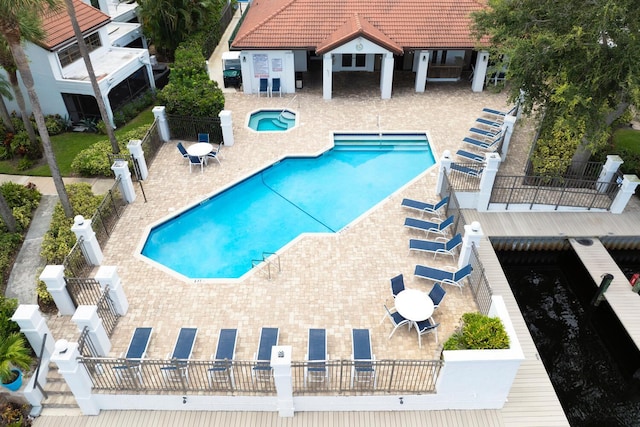 view of swimming pool with a patio area