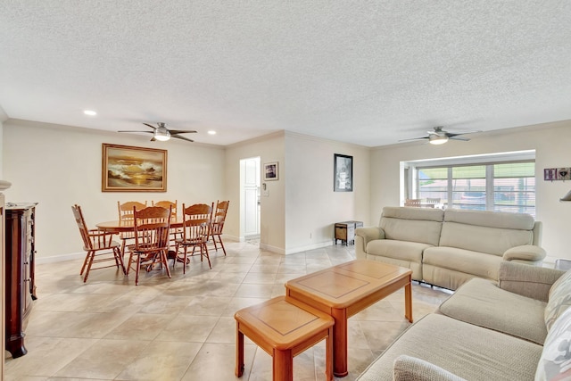 tiled living room with ceiling fan, crown molding, and a textured ceiling