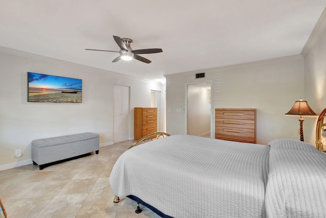 tiled bedroom featuring ornamental molding and ceiling fan