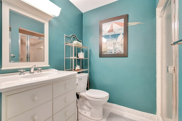 bathroom with vanity, toilet, a shower with door, and tile patterned floors