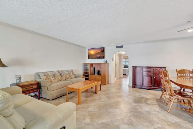 living room with a textured ceiling