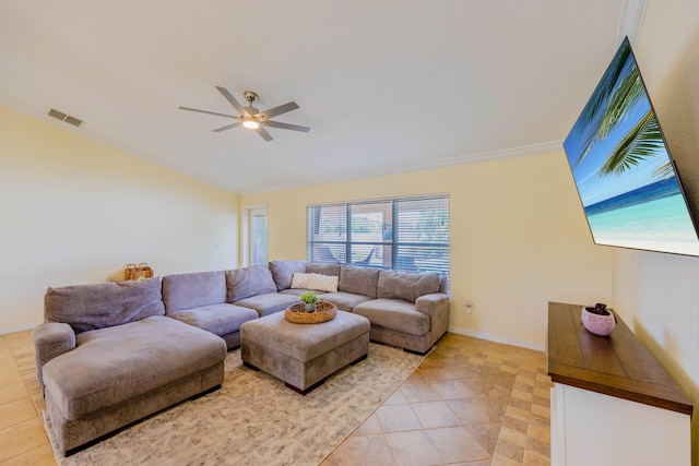 living room featuring ceiling fan and light tile patterned floors