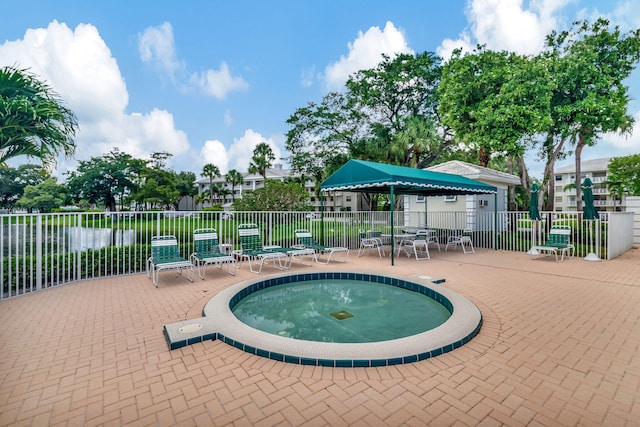 view of swimming pool featuring a patio area