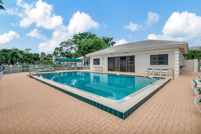 view of pool featuring a patio area