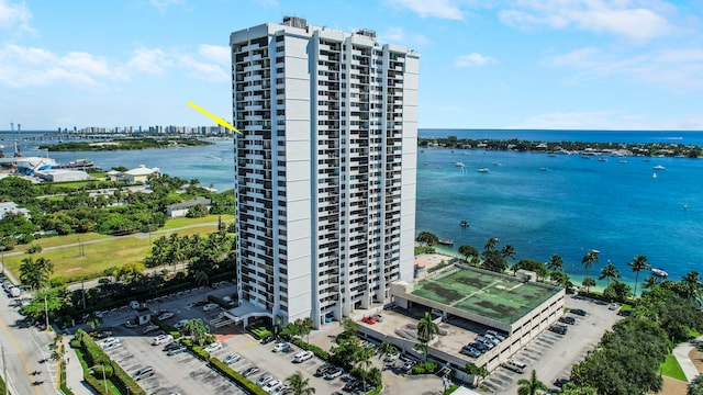 birds eye view of property with a water view