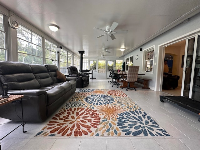 sunroom / solarium with ceiling fan