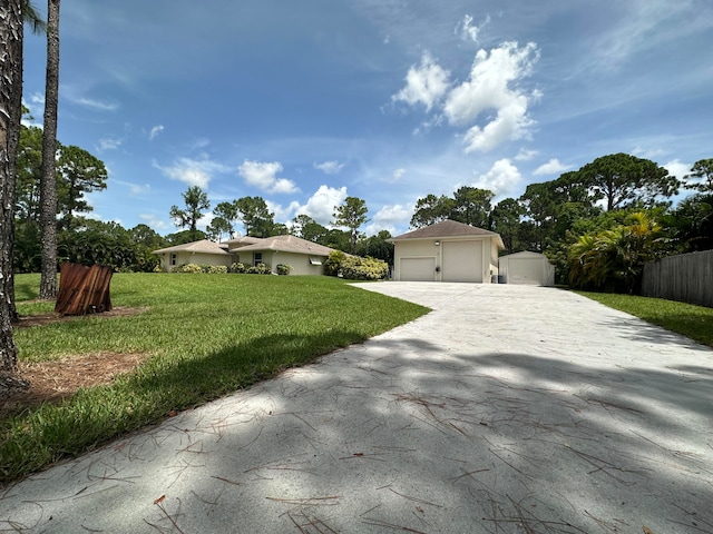 ranch-style house featuring a front lawn