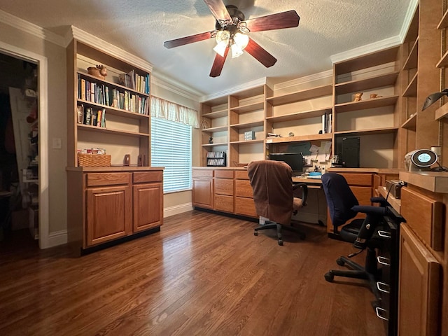 office area featuring a textured ceiling, dark wood-type flooring, ceiling fan, and crown molding