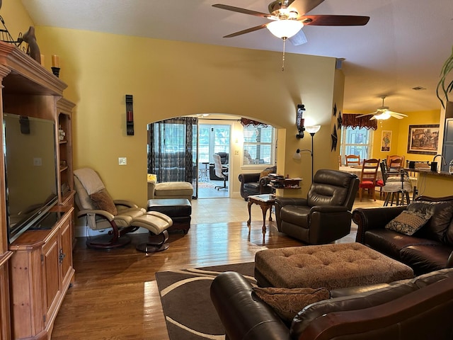 living room with ceiling fan and wood-type flooring