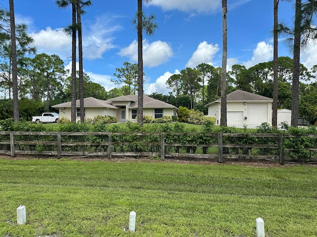 view of yard with a garage