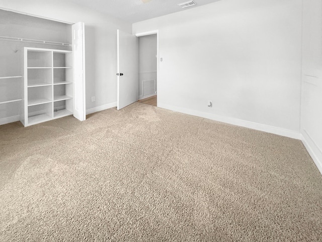 unfurnished bedroom with carpet flooring