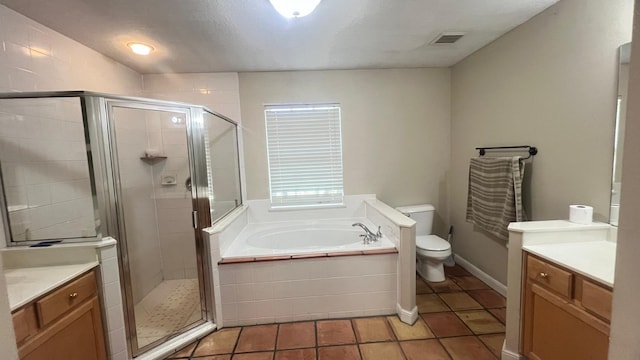 full bath with a shower stall, toilet, vanity, and a garden tub