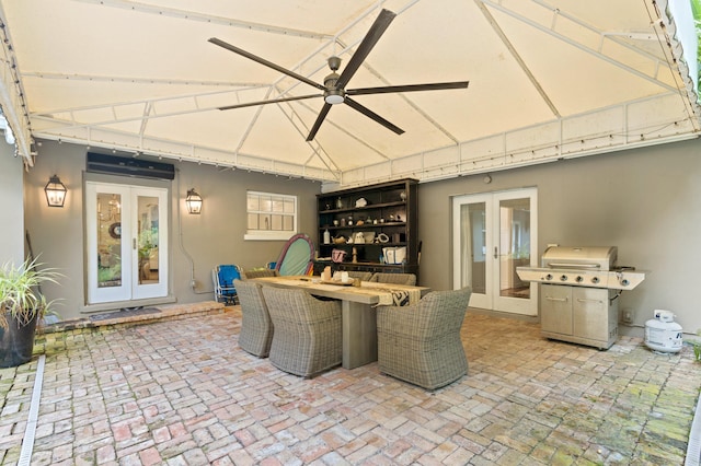 view of patio featuring ceiling fan, french doors, and a grill