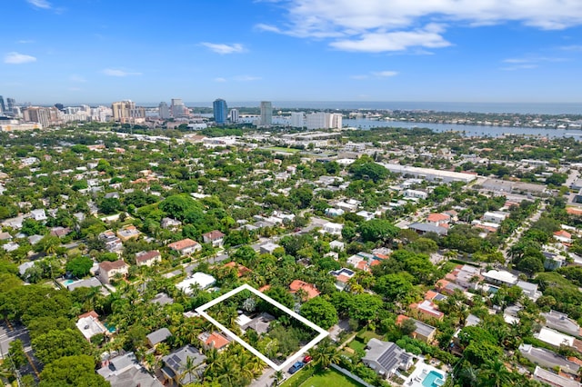 birds eye view of property featuring a water view