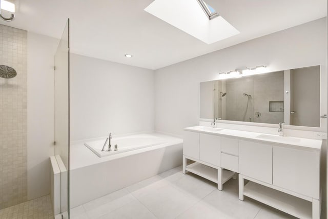 bathroom featuring tile patterned floors, vanity, and independent shower and bath