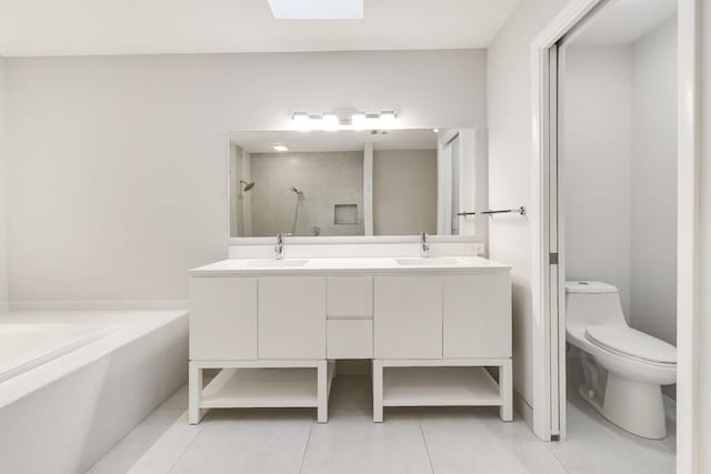 full bathroom featuring tile patterned flooring, vanity, plus walk in shower, and toilet