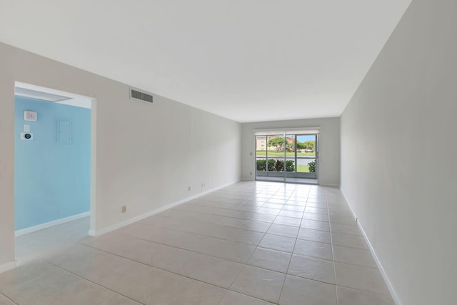 view of tiled spare room