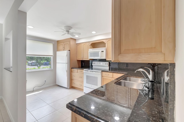 kitchen with white appliances, light brown cabinets, sink, and ceiling fan