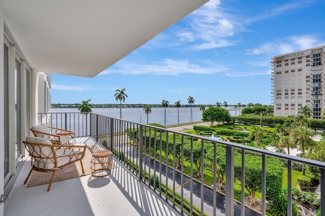 balcony featuring a water view