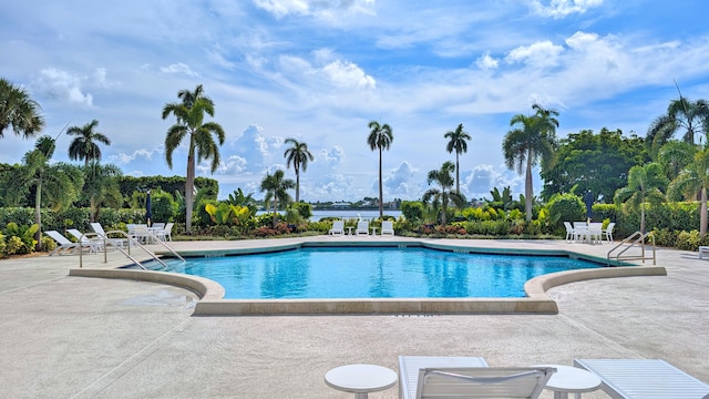 view of swimming pool with a patio area