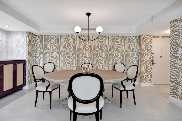 dining room with a notable chandelier