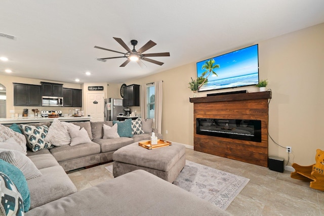 living room with ceiling fan