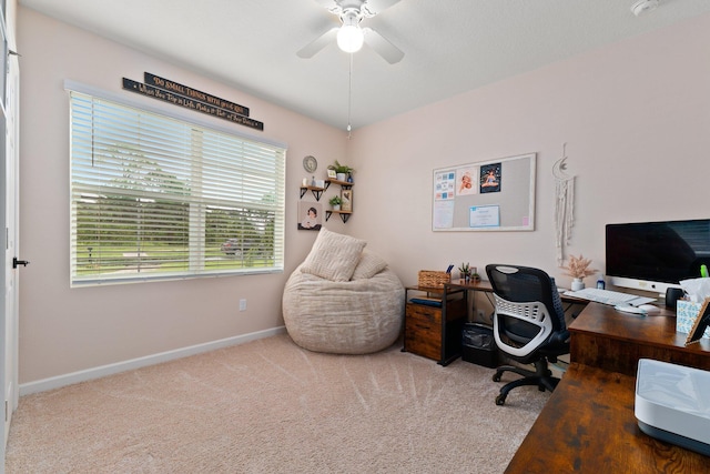 home office with carpet flooring and ceiling fan