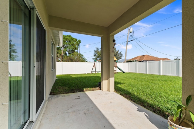 view of patio featuring a playground