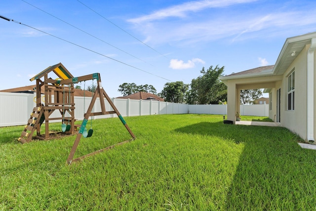 view of yard with a playground