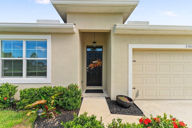 property entrance with a garage