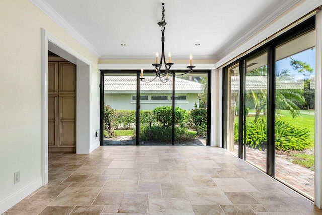 unfurnished dining area with a notable chandelier and crown molding