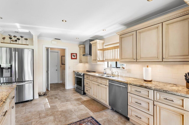 kitchen featuring light stone countertops, wall chimney exhaust hood, sink, and stainless steel appliances