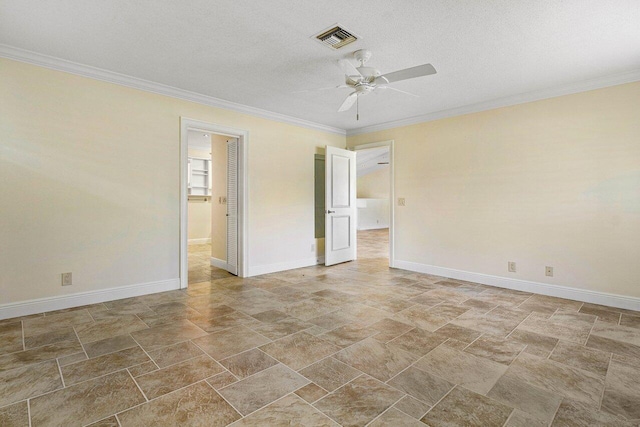 unfurnished room with ceiling fan, a textured ceiling, and ornamental molding