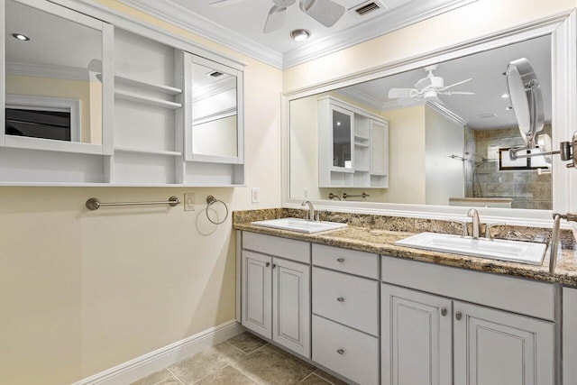 bathroom featuring a tile shower, vanity, ceiling fan, and ornamental molding