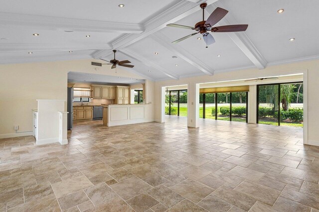 unfurnished living room featuring vaulted ceiling with beams, ornamental molding, and ceiling fan