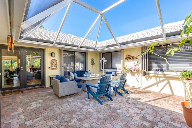 view of patio / terrace with glass enclosure and outdoor lounge area