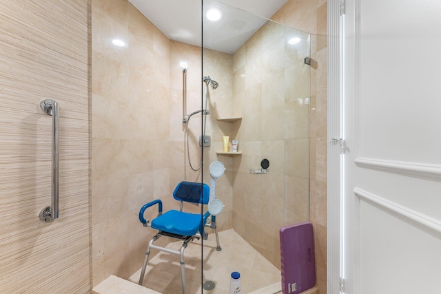 bathroom with tiled shower