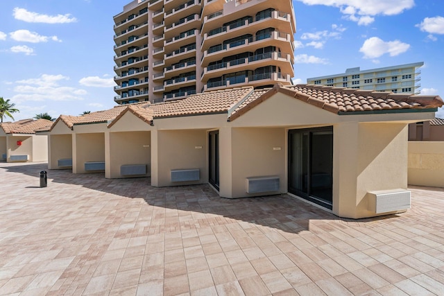 back of property featuring a patio area