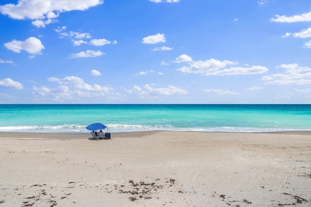 property view of water featuring a view of the beach