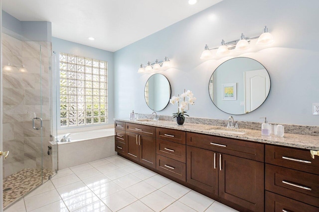 bathroom with vanity, separate shower and tub, and tile patterned flooring