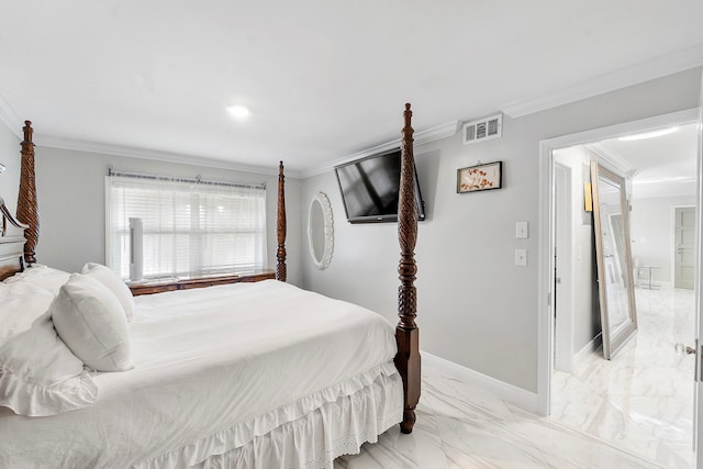 bedroom with crown molding